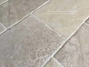 Aged French Limestone Flooring from France loved by architects for kitchen and baths.