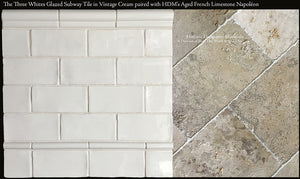 HDM's Glazed Subway Tile in Vintage Warm White Beautifully Paired with Aged French Limestone Napoleon.