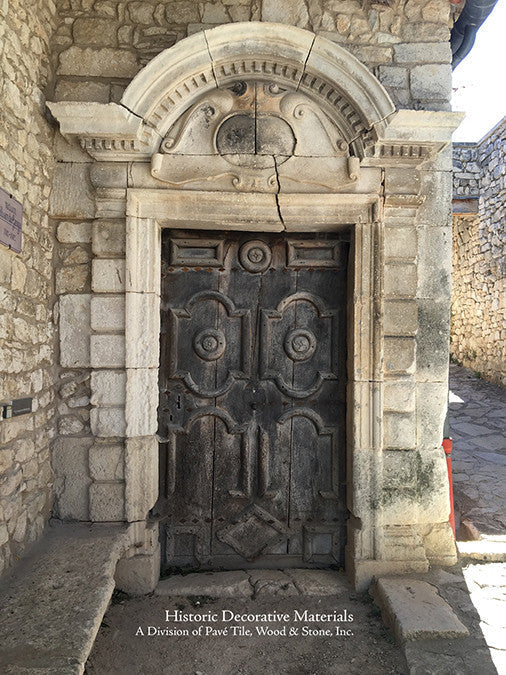 A French limestone and carved wood door, Provence, France