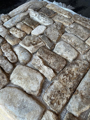 Imagine 17th century French stone masons splitting and hand-hewing each cobblestone to create this French limestone cobblestone path.