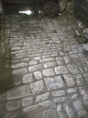 Salvaged from a 17th century relais de poste, these antique French limestone cobblestones were a path that Napoleon walked upon.