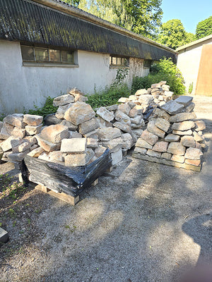 A 17th century thickness of these antique French limestone cobblestones have been cut to a 1 1/4" thickness.