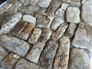Split into beautiful, random shapes, these antique French limestone cobblestones are installed as a cobblestone like centuries before.