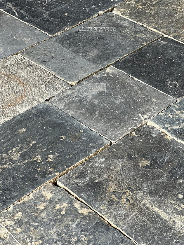 From blue-blacks to stone gray, the handsome color variations of an antique Belgian bluestone floor reveals its authenticity. 
