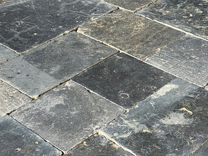 The handsome mixed sizes of antique Belgian bluestone floors are perfect for historic entry ways.