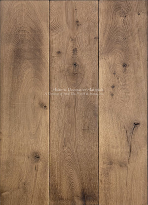Antiqued French oak flooring with warm patina for a grand foyer