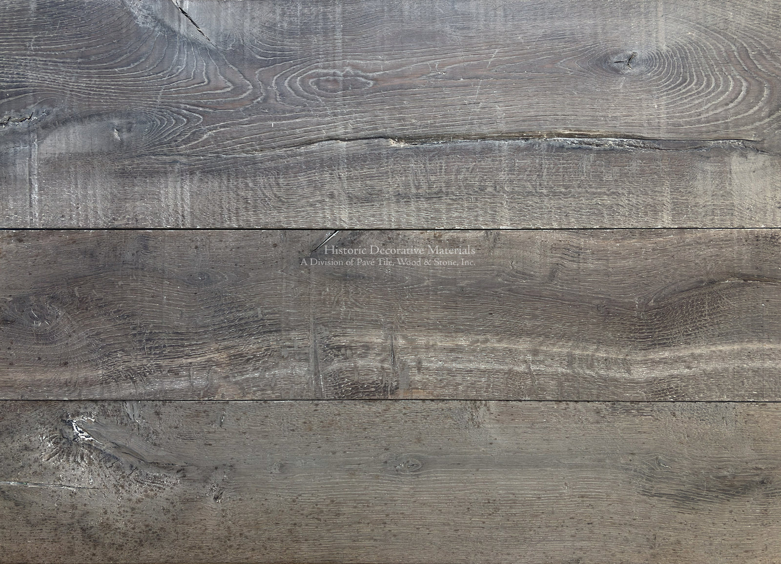 Antiqued French oak flooring is a reclaimed wood patina for English manor homes.