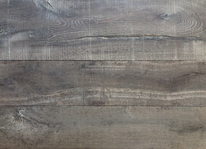 Antiqued French oak flooring is a reclaimed wood patina for English manor homes.