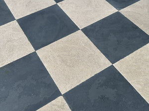 Classic checkerboard layout in antiqued French limestone and ardoise