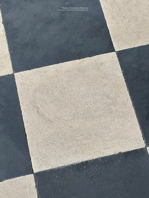 French limestone checkerboard flooring with antiqued black ardoise tiles