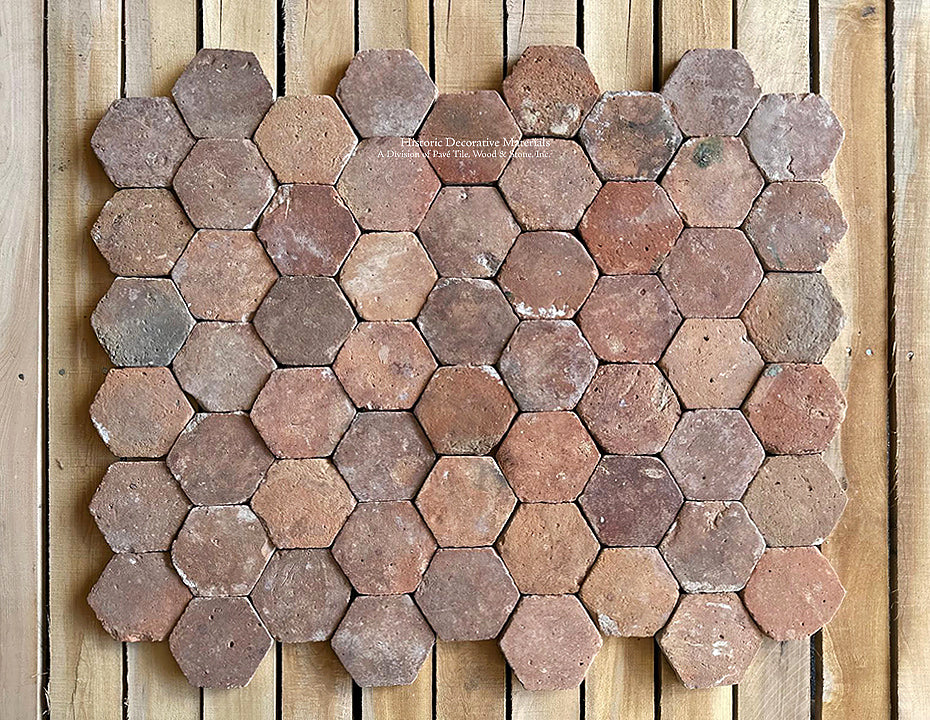 Earth tone color palette of French reclaimed terra cotta tiles exudes history.