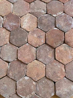 From a powder room to an entry way, rustic elegance is achieved with antique French reclaimed terra cotta tiles.