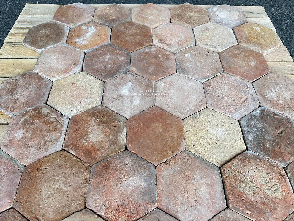 The shape of French Reclaimed Terra Cotta Tile Hexagons creates a beautiful pattern for kitchen floors.