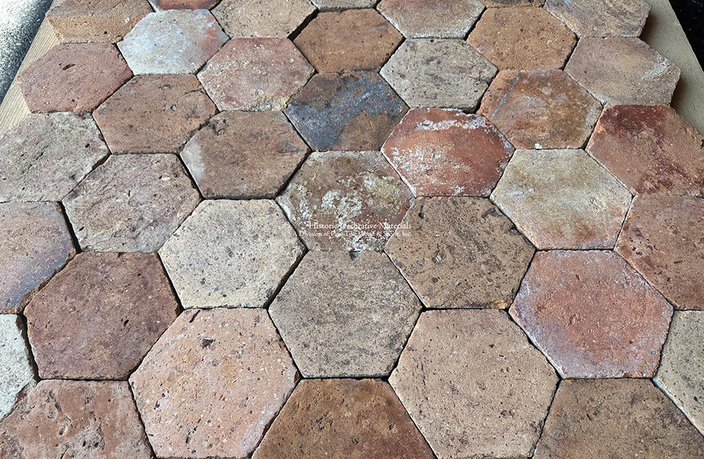 Reclaimed French terra Cotta Tile Hexagons can have colors ranging from blush to chestnut.