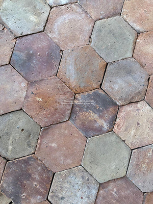 Antique Terra Cotta Floor Tiles in Mediterranean-Inspired Wine Cellar Architecture