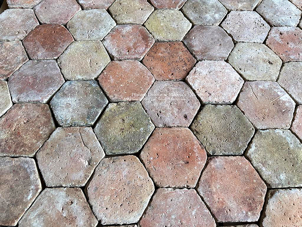 Designing an historic interior can be achieved by installing French reclaimed terra cotta tiles for kitchen floors.