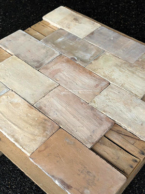 Parefeuille from Provence French Reclaimed Terra Cotta Tiles are installed in a running bond pattern.