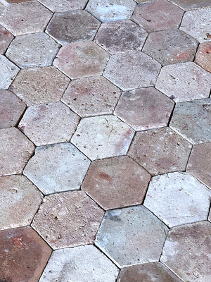 The hexagonal shape and color variation of Le Marais French reclaimed terra cotta tiles make for extraordinary flooring.