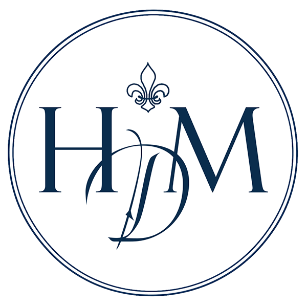 Monogram Logo Historic Decorative Materials suppliers of French oak floors, French limestone, terra cotta tiles, Belgian bluestone & Delft Tiles