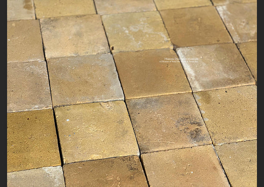 Golden ochre yellows bring Provençal sunshine to this French reclaimed terra cotta tile floor.