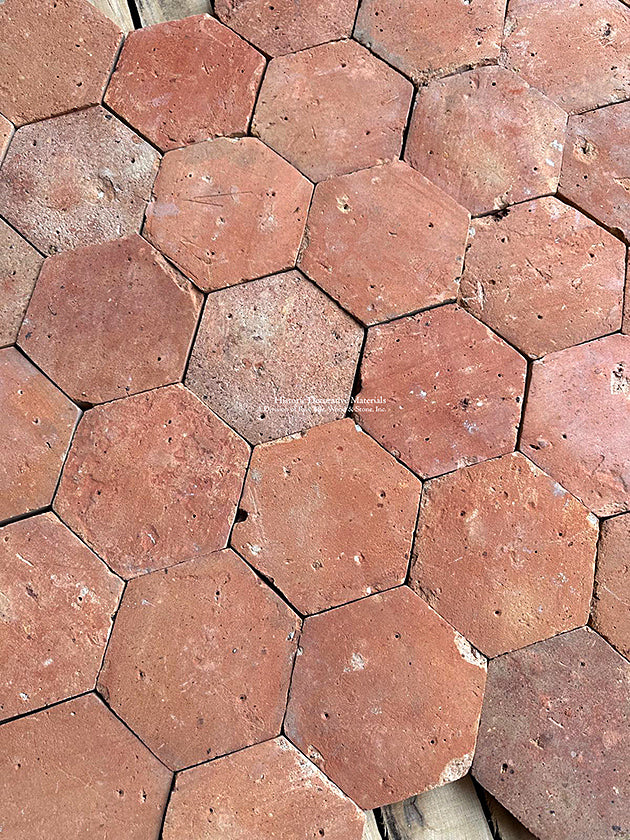 Hand made with surface patina from 150-years ago defines French reclaimed terra cotta tiles.