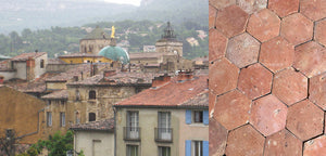 Light and dark red French reclaimed terra cotta tiles mirror the clay roof tiles or tuiles in Provence.