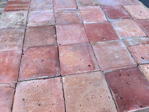 Historic French terra cotta tiles circa 1875 with worn surfaces firing marks and mineral inclusions