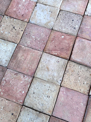 Antique French terra cotta flooring from Brittany with pale terracotta, dusty salmon and creamy stone colors