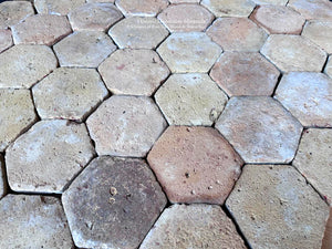 Reclaimed French terra cotta tile hexagon flooring for authentic European interior design