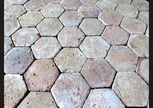 Reclaimed French terra cotta tiles antique hexagon flooring from Italian-French border sheep and goat farm