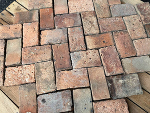 Reclaimed French terra cotta floor bricks with authentic medieval patina