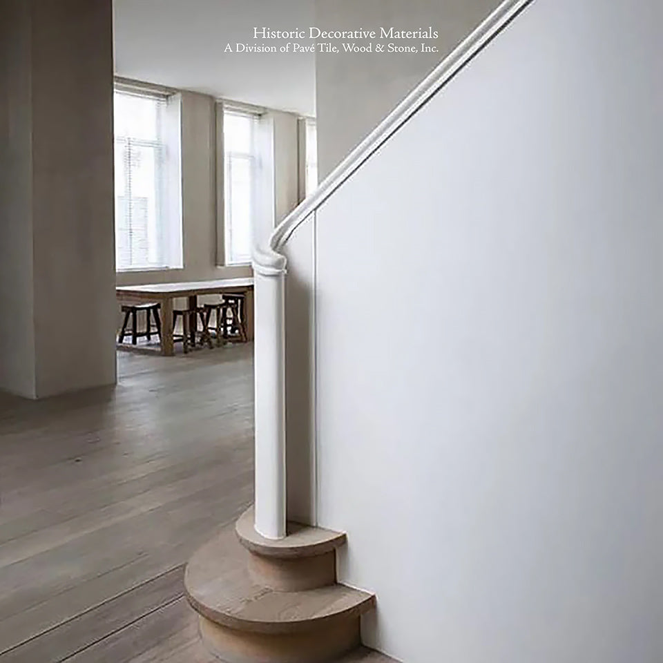 Custom stair treads and wide planks are hallmarks of our aged pre-finished French oak flooring.