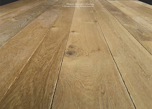 The antique French oak floor in wide-planks is a showstopper.