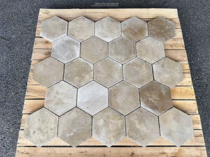 The most  organic of color palettes in neutral antique ivory colors define this antique Belgian hexagon cement.