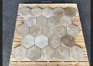 Antique ivory colors are the hallmark of this antique Belgian hexagon cement tile.