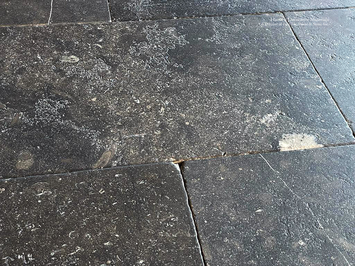 Antiqued Belgian Bluestone Flooring | Hand-finished patina for timeless authenticity.