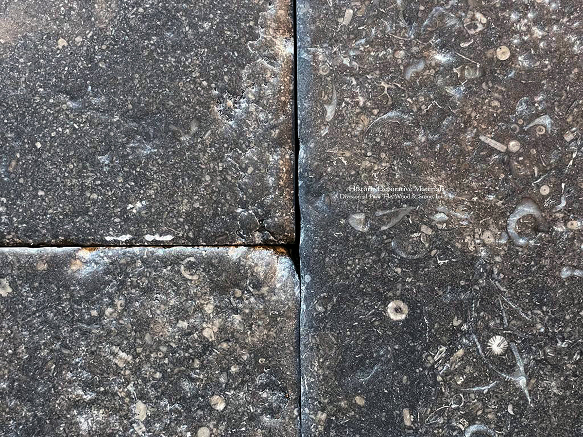 Antiqued Belgian Bluetone Floors adds a handsome anchor to historic interiors.