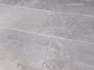 Antiqued French Limestone Flooring | Neutral Beige Patina for nuanced interiors.