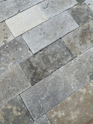 Antiqued French limestone flooring and wall cladding Lot inspired by historic French architecture