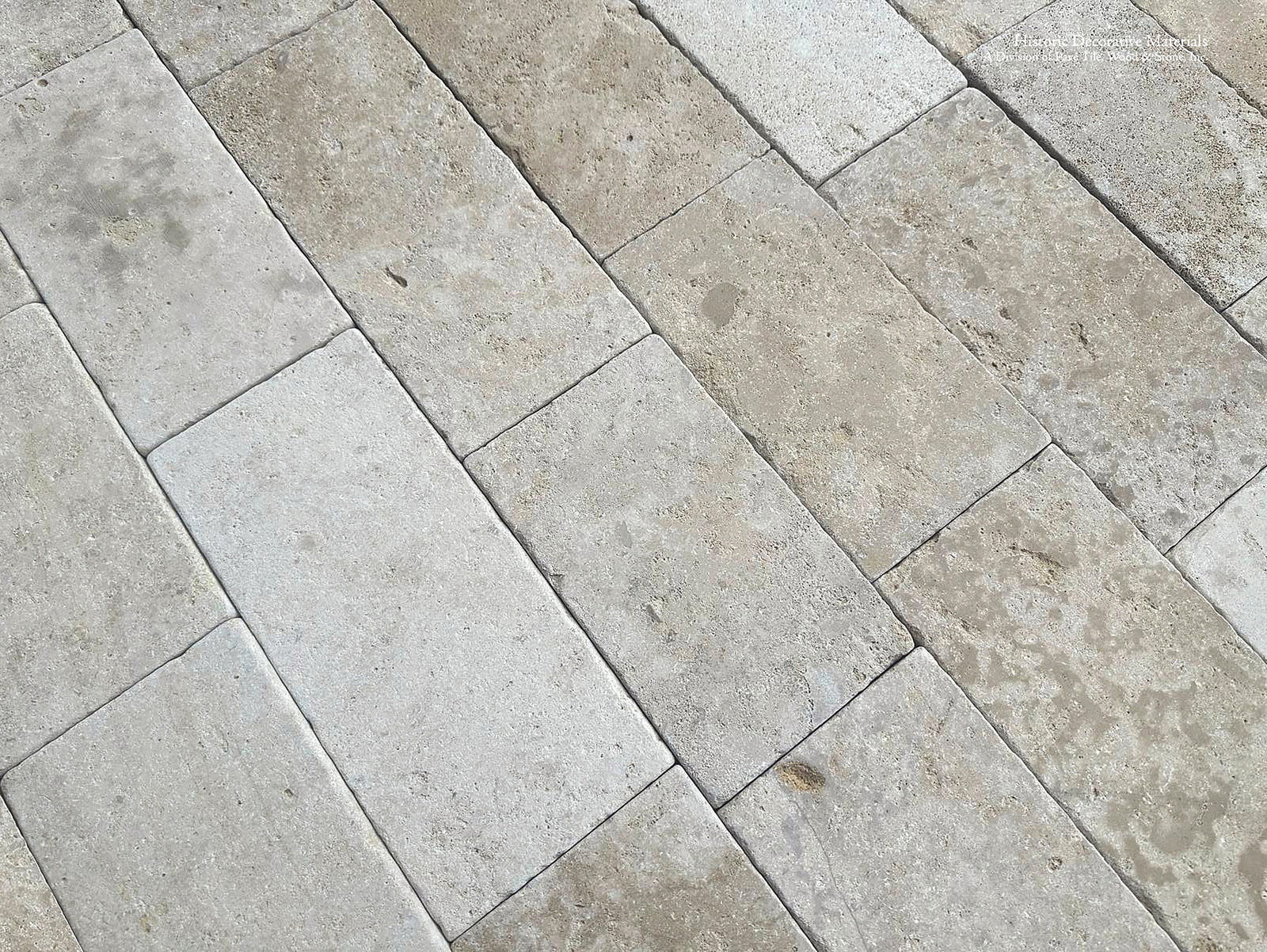 Antiqued French limestone flooring Périgord with weathered chalk limestone and fossilized surface