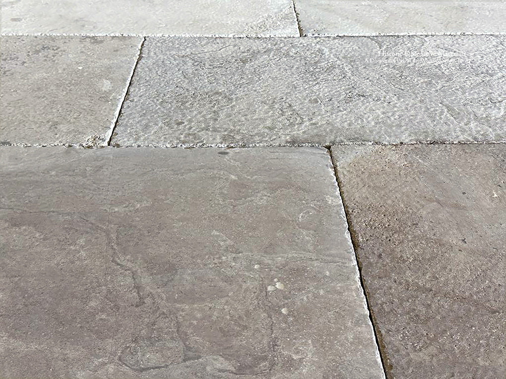 Antiqued French Limestone Flooring | Artisanally crafted for luxury interiors.