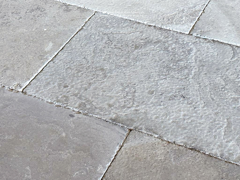 Rich patina antiqued French Limestone tiles | historic surface textures for period homes.
