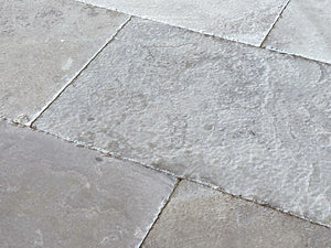 Rich patina antiqued French Limestone tiles | historic surface textures for period homes.