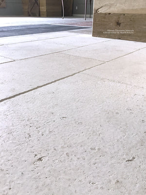 Antiqued French Limestone Flooring | Hand hammered patina creates dimension and authenticity.