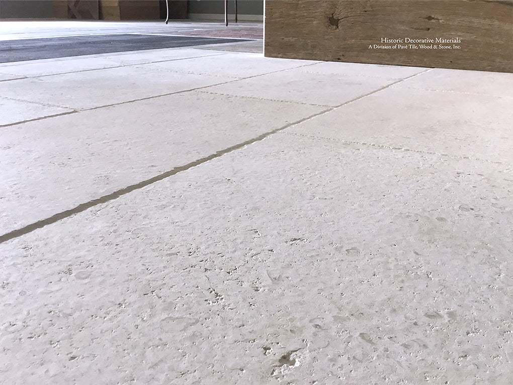 Antiqued French Limestone Flooring | Surface patina softens white limestone color palette.