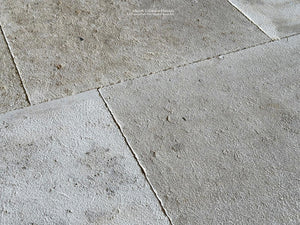 Antiqued French Oak Flooring with a hand-hammered patina will add architecutral history to an interior.