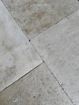 Antiqued French limestone floors will last for generations.