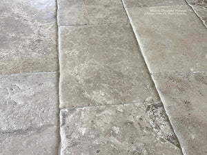 Antiqued French Limestone Flooring | Aged Edge Details creates authetnic, historic flooring.