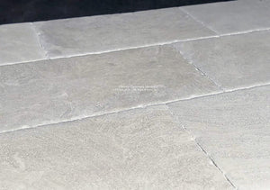 Hand-finished antique French limestone floors reveals a smooth, satin patina.