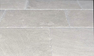 The beautiful underlations of antiqued French limestone floors reveal an elegance for period homes.